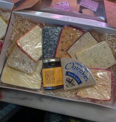 Whey Funky Flavoured Cheese Box - A carefully curated selection of 8 artisan cheese wedges paired with a jar of Kick-Ass Hot Plum Chutney and Orkney Thin Oatcakes. Ideal for gifting or self-indulgence.