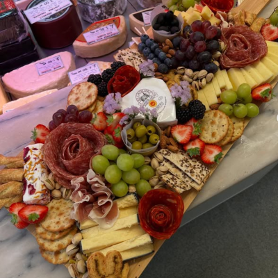 Celebration Platter - Bold, vibrant, and party-perfect — this large cheese board features award-winning wedges, fresh fruits, nuts, cured meats and gourmet crackers. A show-stopper for any occasion.